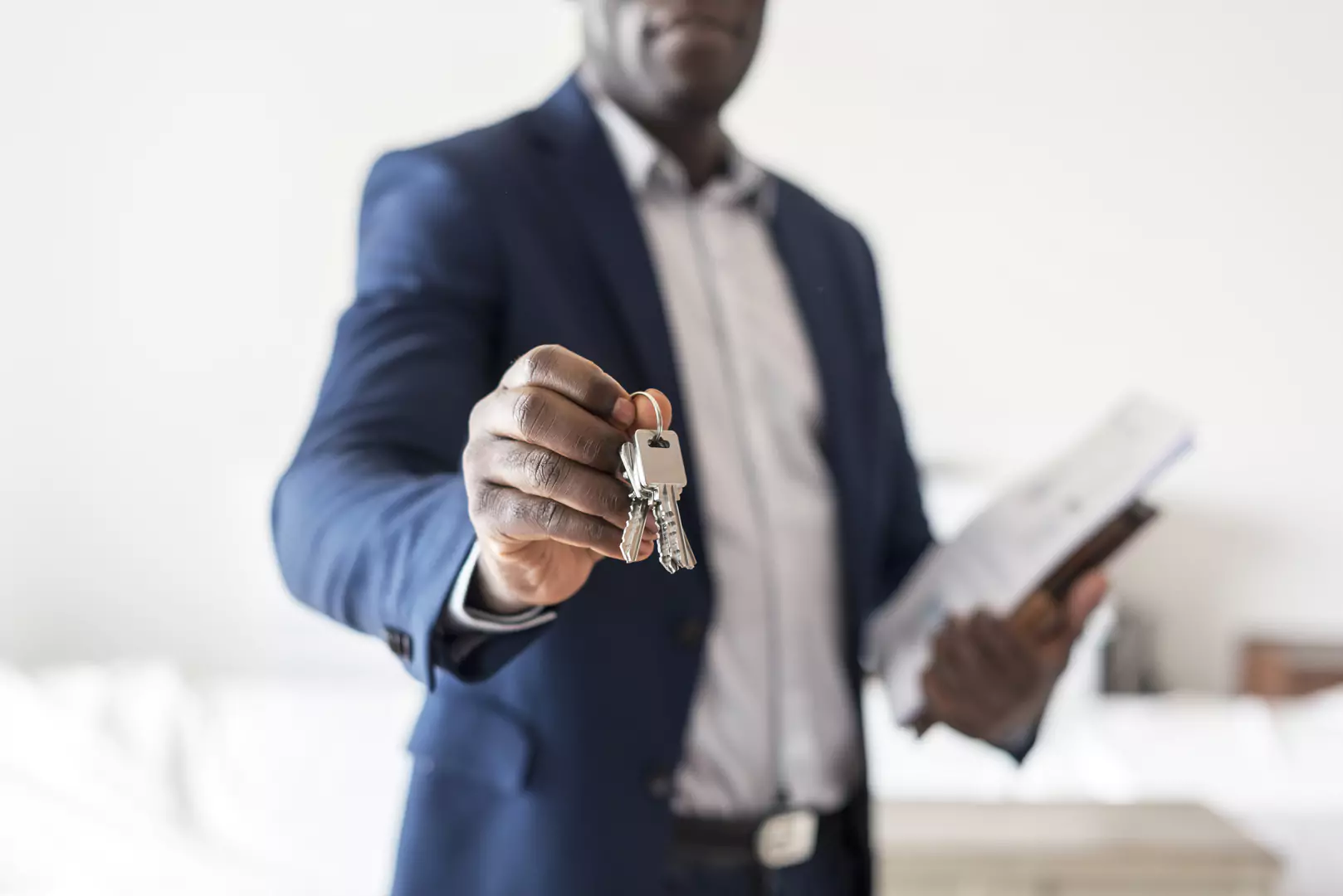 real-estate-agent-handing-the-house-key-2025-02-09-22-54-22-utc-68958b373b434
